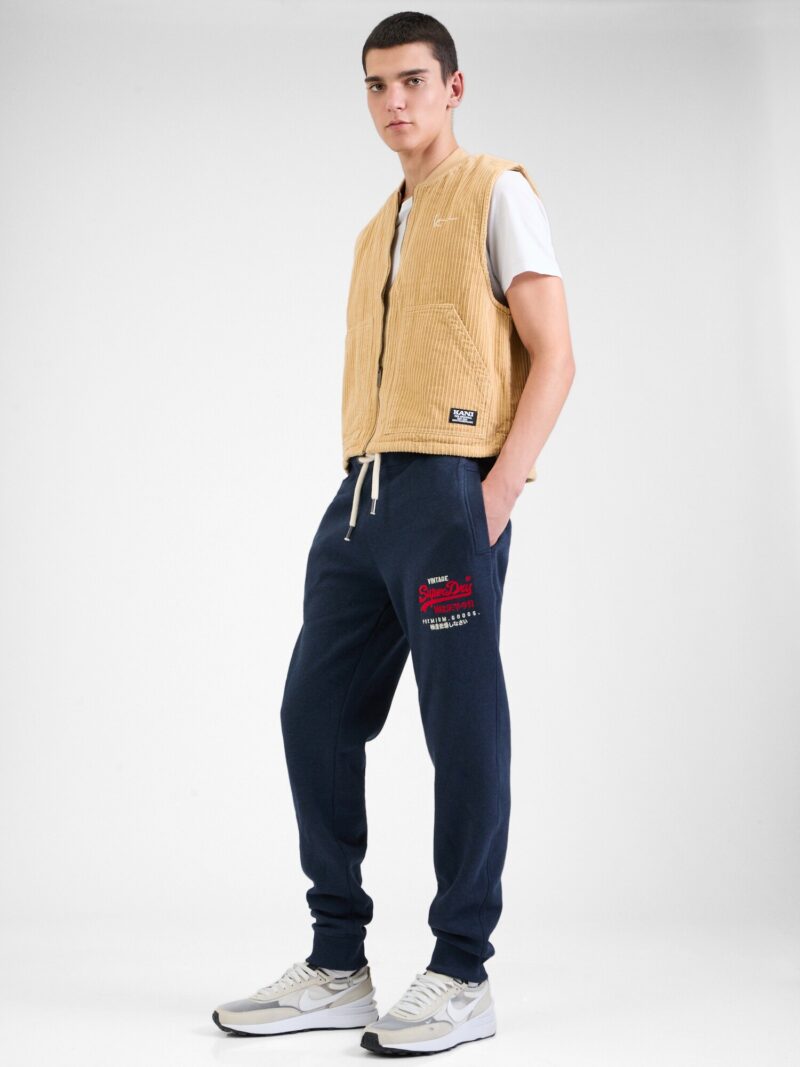 Cumpăra Superdry Pantaloni  bleumarin / roșu / alb