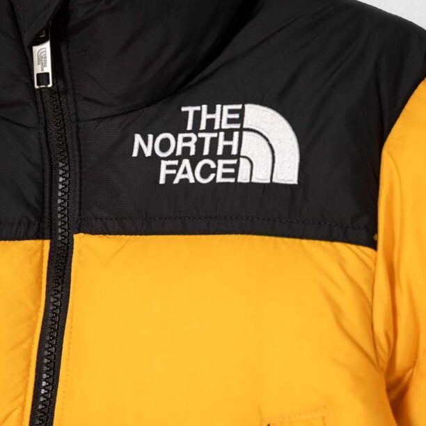 The North Face geaca de puf pentru copii 1996 RETRO NUPTSE JACKET culoarea galben preţ