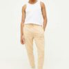 Tommy Jeans pantaloni de trening culoarea bej