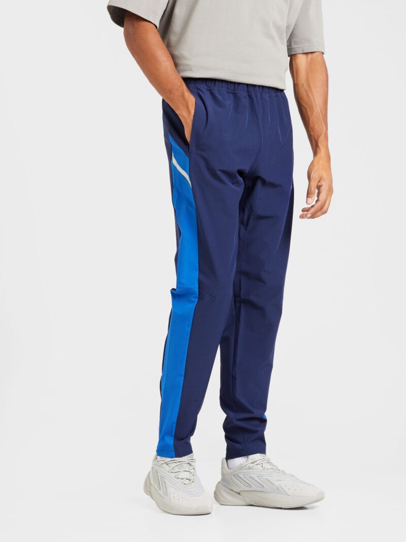 Cumpăra UNDER ARMOUR Pantaloni sport 'Utility'  albastru / albastru închis / alb