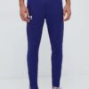 Under Armour pantaloni de trening Pique culoarea violet