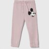 United Colors of Benetton pantaloni de trening din bumbac pentru copii x Disney culoarea violet