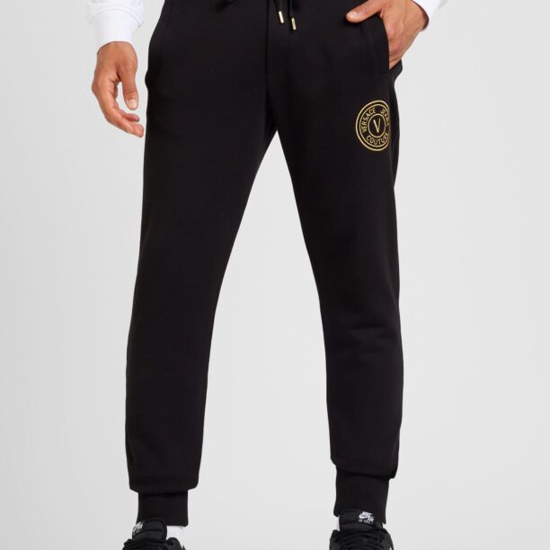 Cumpăra Versace Jeans Couture Pantaloni  auriu / negru