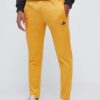 adidas pantaloni de trening culoarea galben