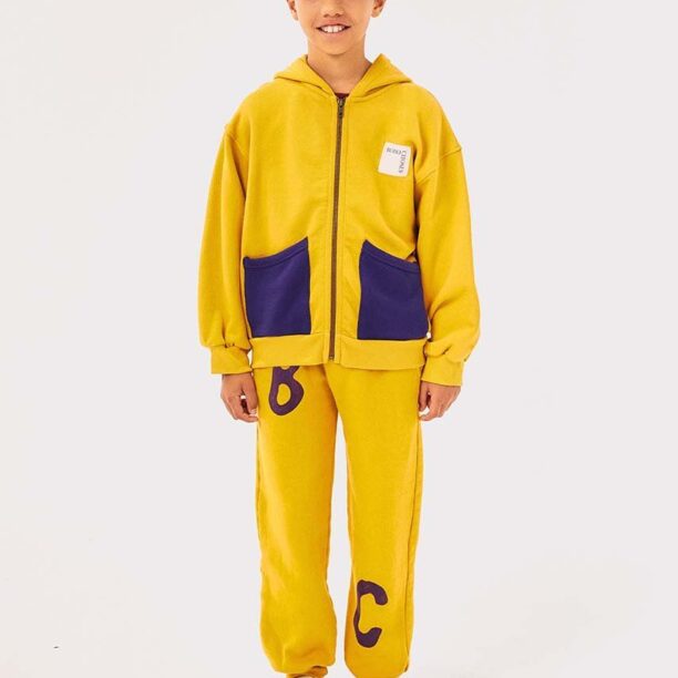 Bobo Choses pantaloni de trening din bumbac pentru copii culoarea galben