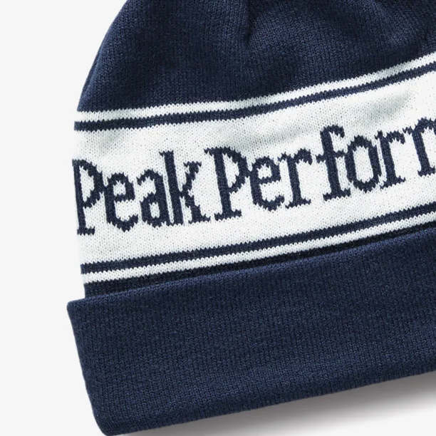 Căciulă de iarna Peak Performance Pow Hat - blue shadow/offwhite preţ