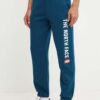 The North Face pantaloni de trening Pant Varsity Graphic culoarea turcoaz