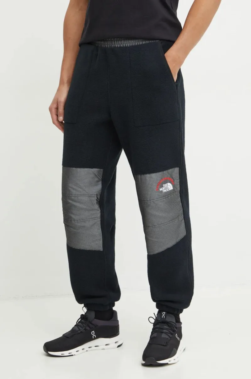 The North Face pantaloni de trening TNF x 30th Years HMLYN culoarea negru