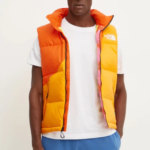 The North Face vesta de puf TNF x Yinka Ilori culoarea portocaliu