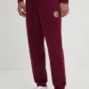 Tommy Jeans pantaloni de trening din bumbac culoarea bordo