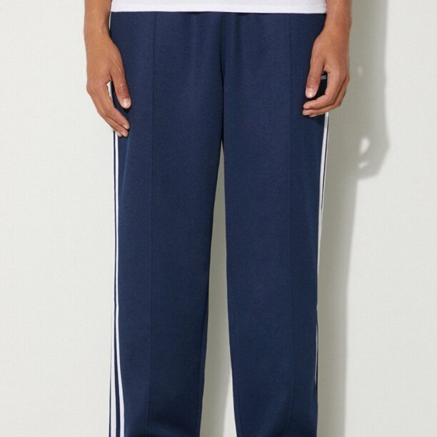 adidas Originals pantaloni de trening Adicolor Baggy Fit Firebird Pant culoarea albastru marin