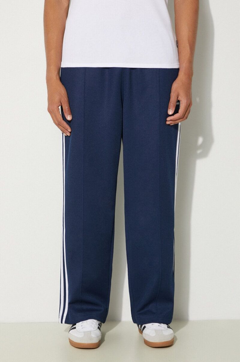 adidas Originals pantaloni de trening Adicolor Baggy Fit Firebird Pant culoarea albastru marin