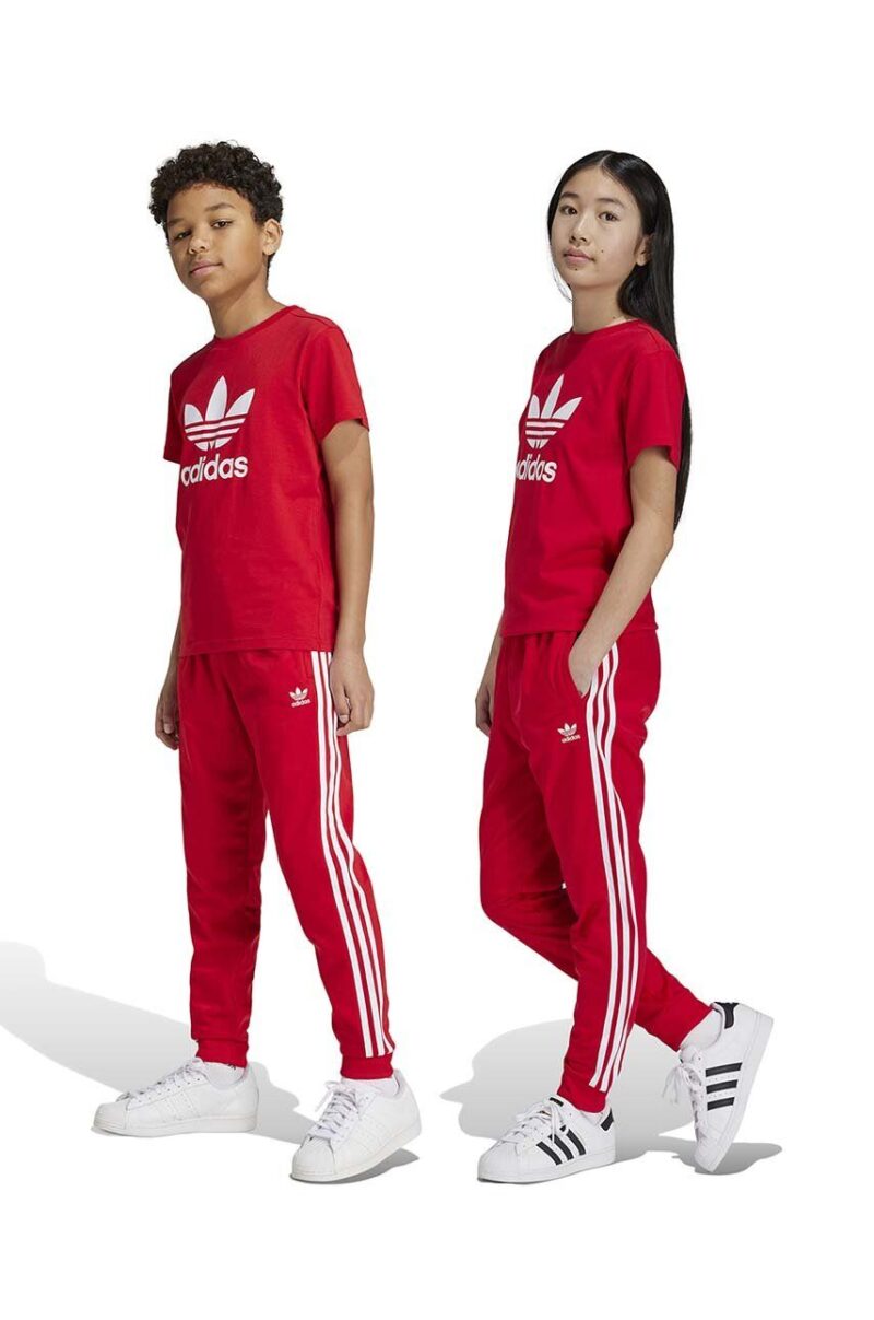 adidas Originals pantaloni de trening pentru copii SST TRACK PANTS culoarea rosu