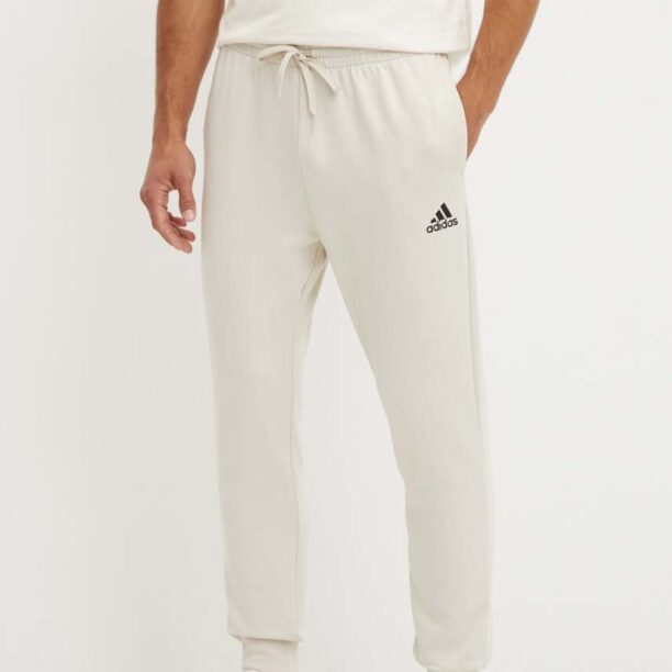 adidas pantaloni de trening Essentials culoarea bej