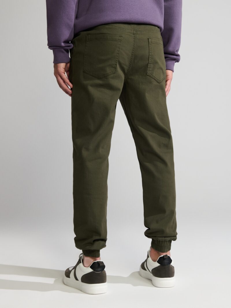 Cumpăra Pantaloni jogger - verde-prăfuit