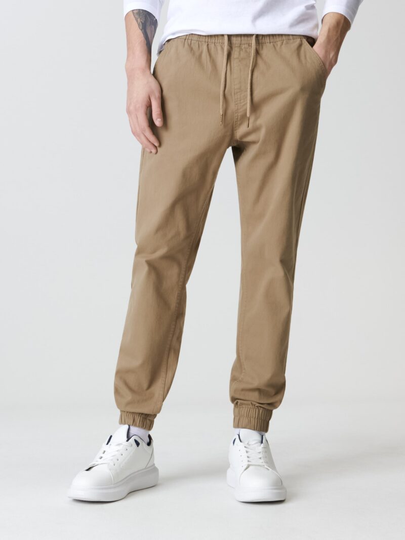 Cumpăra Pantaloni joggers - bej