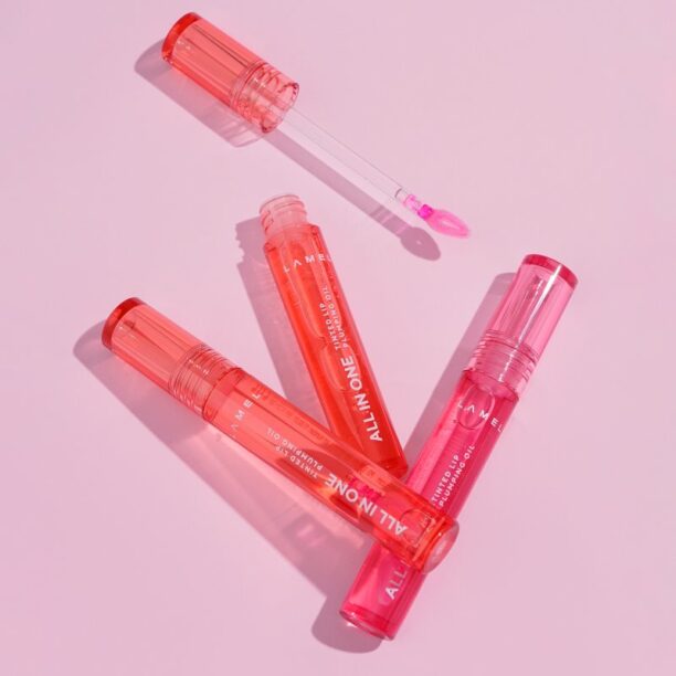 Preţ LAMEL All in One Lip Tinted Plumping Oil ulei nuanțator pentru buze pentru volum maxim № 402 Pink Sparkle 3 ml